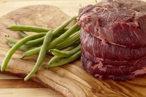 Raw Beef Tenderloin and Green Beans — Stock Photo