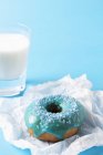 Doughnut with turquoise glaze — Stock Photo