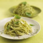 Spaghetti pasta with basil pesto — Stock Photo