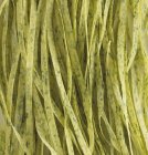 Spinach tagliatelle pasta — Stock Photo