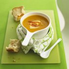 Creamy soup with butternut squash — Stock Photo