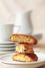 Closeup view of stacked Biscotti on white plate — Stock Photo