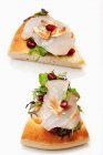 Pizza with fish carpaccio and pomegranate seeds — Stock Photo