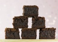 Fresh baked brownies pyramid — Stock Photo