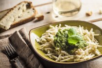 Gemelli pasta with basil sauce — Stock Photo