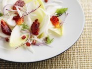 Winter salad of chicory — Stock Photo