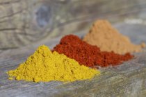 Closeup view of three mounds of different spices — Stock Photo
