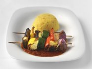 Skewers with couscous serving — Stock Photo