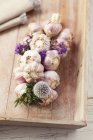 Plaited garlic bulbs — Stock Photo