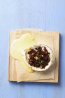 Baked Camembert with sundried tomatoes — Stock Photo