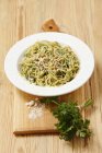 Spaghetti pasta with parsley pesto — Stock Photo