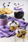 Blueberry muffins placed on napkin — Stock Photo