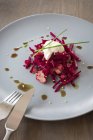 Beetroot salad with beef and creme frache — Stock Photo