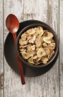 Cornflakes with banana chips almonds — Stock Photo