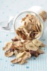 Spelt flakes with dried bananas and raisins — Stock Photo