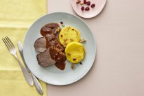 Roast beef with cranberry sauce — Stock Photo