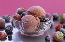 Berry ice cream with frozen berries — Stock Photo