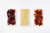 Three crispbreads with jam — Stock Photo