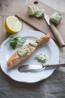 Salmon fillet with butter — Stock Photo