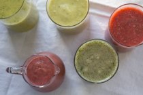 Green and red smoothies — Stock Photo
