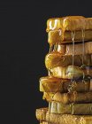 Stacks of toast with honey — Stock Photo
