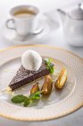 Chocolate tart with creme anglaise — Stock Photo