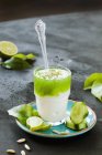 Yoghurt with cucumber in glass — Stock Photo