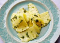 Pineapple carpaccio with pesto — Stock Photo