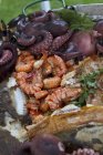 Fried fish with prawns and octopuses — Stock Photo