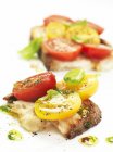 Bruschetta topped with tomatoes — Stock Photo