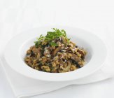 Closeup view of mushroom Risotto with herbs — Stock Photo