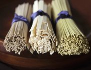 Three bundles of noodles — Stock Photo