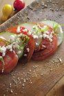 Tomates et concombres tranchés — Photo de stock