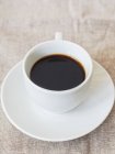 Cup of red espresso — Stock Photo