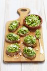Crostini topped with broadbeans — Stock Photo