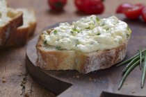 Slice of baguette topped with egg salad — Stock Photo