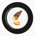 Fashion Food on plate — Stock Photo
