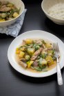 Pork with potatoes on plate — Stock Photo