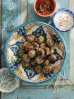 Meatballs on decorative plate — Stock Photo