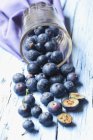 Blueberries with upturned glass — Stock Photo