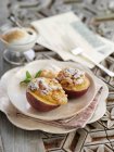 Closeup view of peaches filled with amaretti — Stock Photo