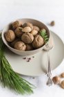 Bowl of walnuts and almonds — Stock Photo