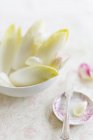 Chicory and edible petals — Stock Photo