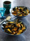 Mussels in curry broth — Stock Photo