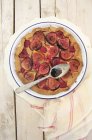 Crostata with figs on white plate with spoon — Stock Photo