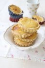 Stack of almond tartlets — Stock Photo