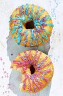 Doughnuts with coloured icing — Stock Photo