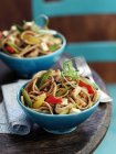 Noodles with tofu and peppers — Stock Photo