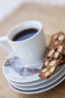 Cup of coffee and almond — Stock Photo