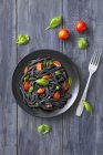 Black squid ink linguine pasta — Stock Photo